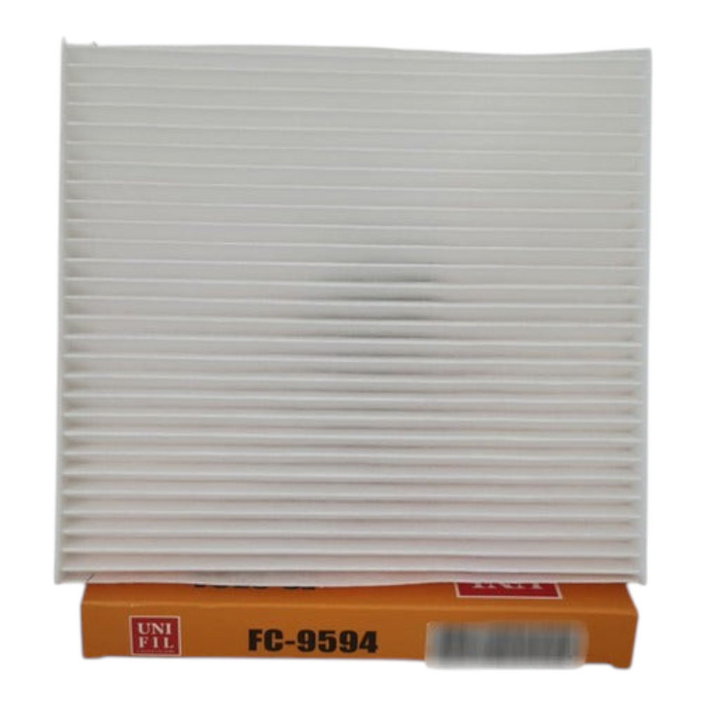 Filtro de cabina Unifil FC-9594 para Chevrolet Spark 1.2L, diseño rectangular plisado de color blanco